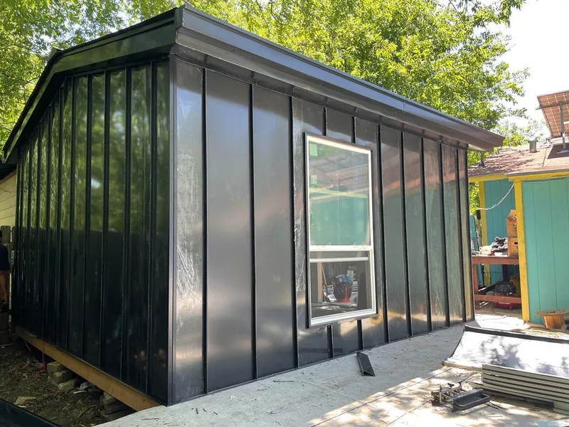 Black standing seam metal wall panels for Roof Inspection in Casper